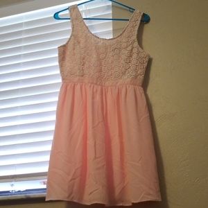 Pink and white summer dress with a flowered top